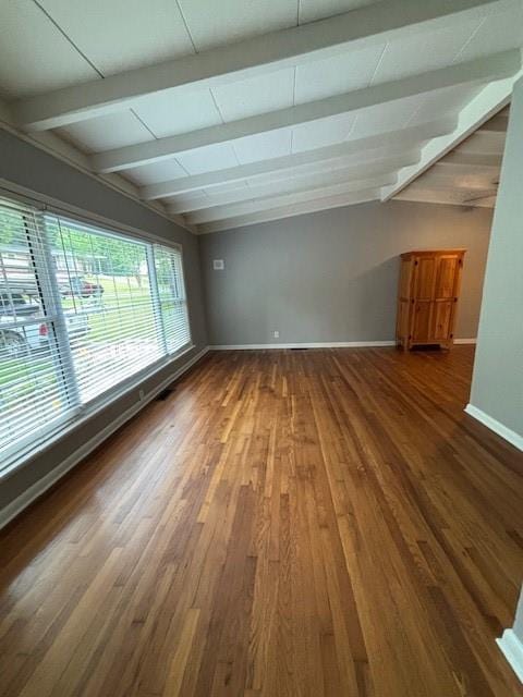 1177 Baker Ln, Marietta, GA 30062 - empty room with beamed ceiling, baseboards, and wood finished floors