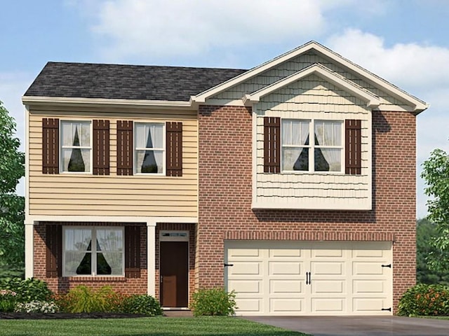 view of front of property featuring a front yard and a garage