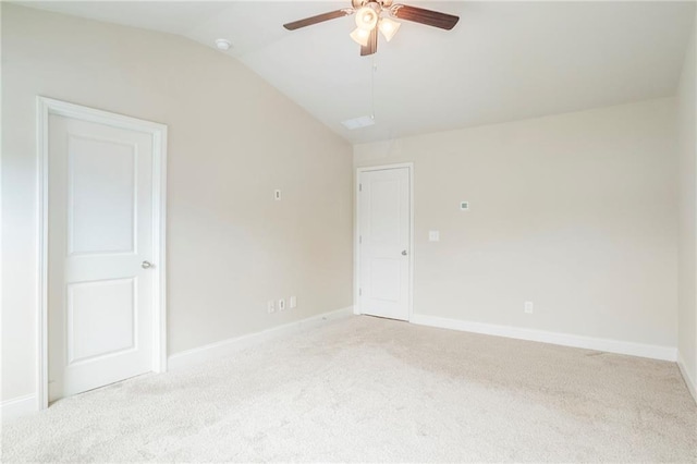 235 Orchard Dr, Covington, GA 30014 - spare room with light carpet, lofted ceiling, a ceiling fan, and attic access