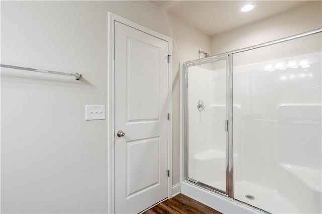 235 Orchard Dr, Covington, GA 30014 - full bathroom with a shower stall and wood finished floors