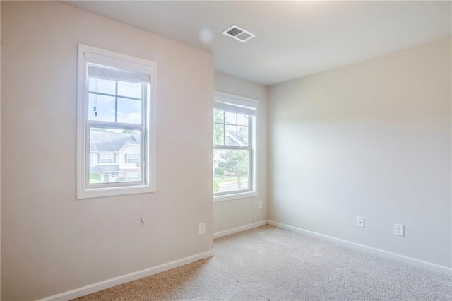 235 Orchard Dr, Covington, GA 30014 - empty room featuring carpet floors and baseboards