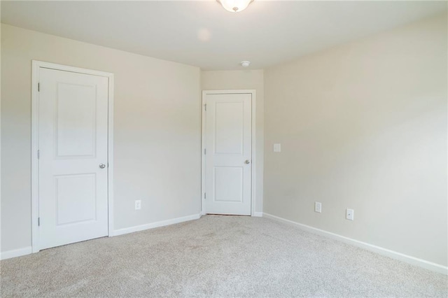 235 Orchard Dr, Covington, GA 30014 - carpeted empty room featuring baseboards