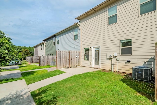 235 Orchard Dr, Covington, GA 30014 - rear view of house with a patio