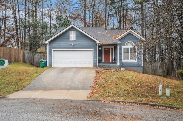 ranch-style house with a front yard and a garage