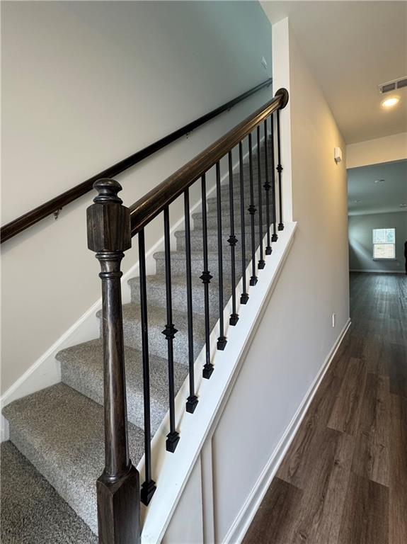2277 Whitworth St, Lawrenceville, GA 30044 - stairway featuring wood finished floors and baseboards