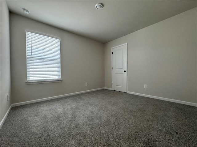 2277 Whitworth St, Lawrenceville, GA 30044 - carpeted spare room featuring baseboards