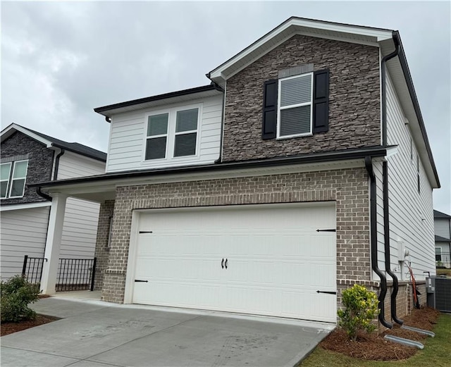 2277 Whitworth St, Lawrenceville, GA 30044 - traditional-style home with a garage, brick siding, central air condition unit, and driveway