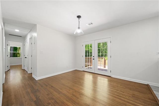 2340 Cresta Dr, Decatur, GA 30032 - unfurnished room featuring dark wood-type flooring, plenty of natural light, french doors, and baseboards
