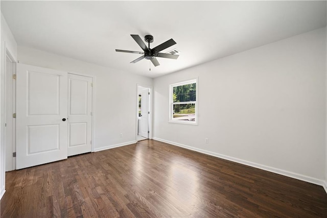 2340 Cresta Dr, Decatur, GA 30032 - unfurnished bedroom featuring dark wood-style floors, baseboards, and a ceiling fan