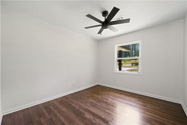 2340 Cresta Dr, Decatur, GA 30032 - spare room with dark wood finished floors, baseboards, and a ceiling fan
