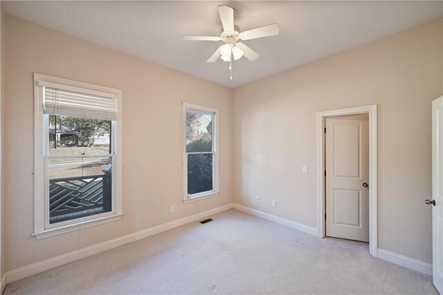 403 Pebblebrooke Ln, Canton, GA 30115 - empty room featuring light colored carpet, plenty of natural light, and baseboards
