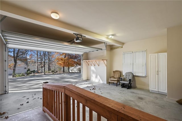 403 Pebblebrooke Ln, Canton, GA 30115 - garage with a garage door opener and baseboards