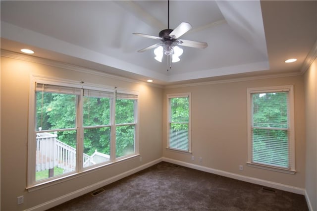 403 Pebblebrooke Ln, Canton, GA 30115 - unfurnished room with a tray ceiling, ceiling fan, ornamental molding, baseboards, and dark carpet