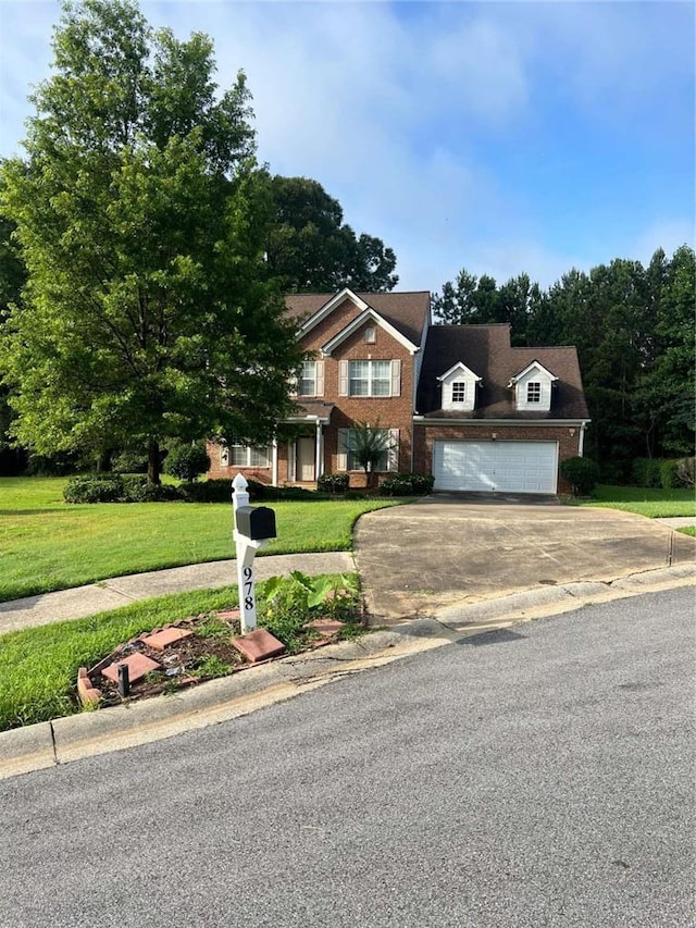 978 Francis Ln, Fairburn, GA 30213 - view of front facade with concrete driveway and a front lawn