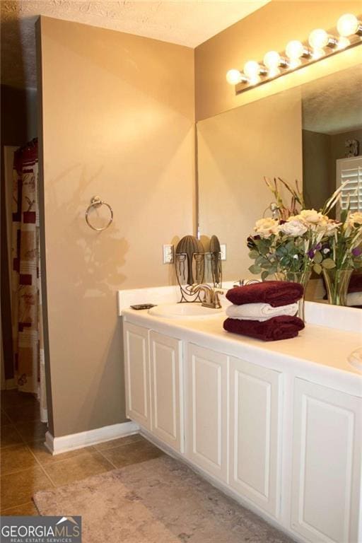 978 Francis Ln, Fairburn, GA 30213 - full bath with double vanity and tile patterned flooring