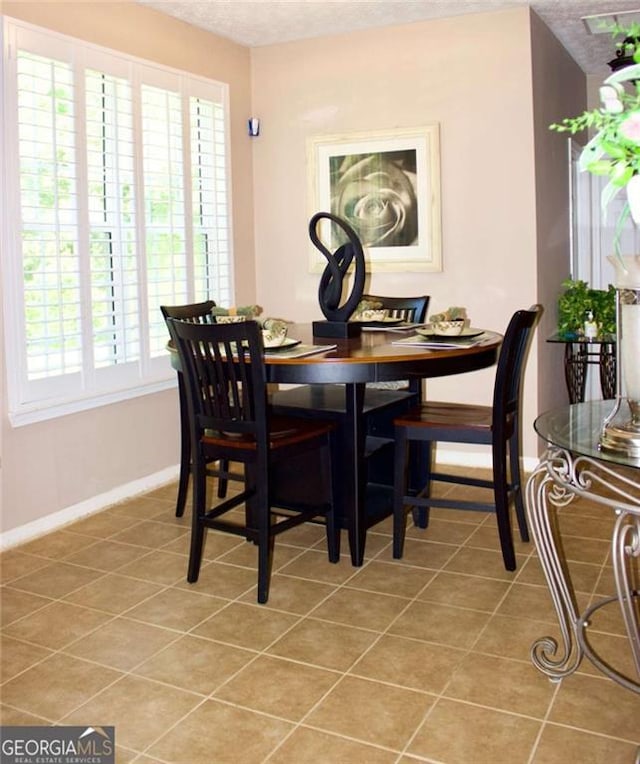 978 Francis Ln, Fairburn, GA 30213 - dining space featuring light tile patterned flooring