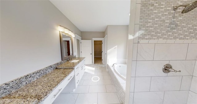 bathroom with tile patterned floors, vanity, and independent shower and bath