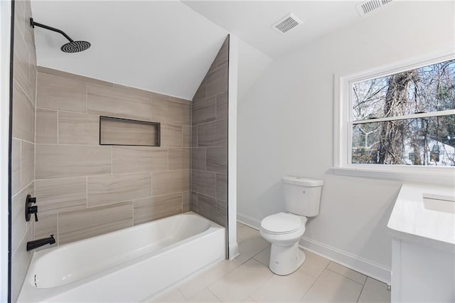 full bathroom featuring baseboards, toilet, vaulted ceiling, tile patterned floors, and bathing tub / shower combination