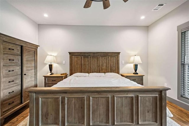 bedroom featuring ceiling fan and light wood-type flooring