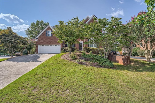 view of front of home featuring a garage and a front lawn