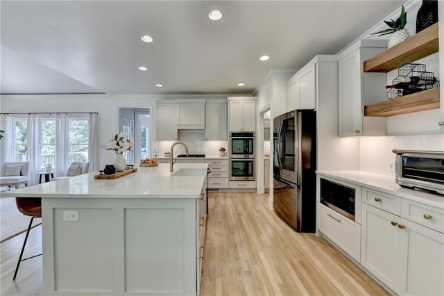 7920 Tintern Trce, Duluth, GA 30097 - kitchen featuring smart refrigerator, stainless steel double oven, open shelves, light countertops, and light wood-style flooring
