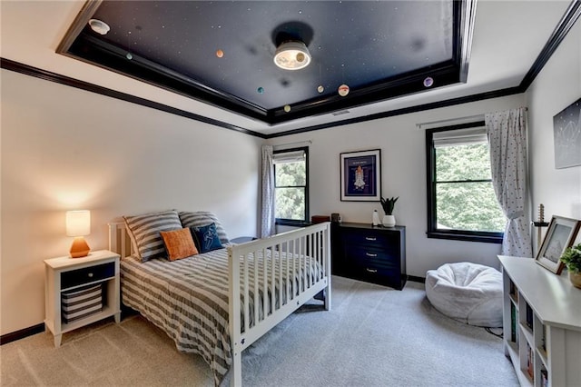 7920 Tintern Trce, Duluth, GA 30097 - bedroom featuring light colored carpet, crown molding, a tray ceiling, and baseboards