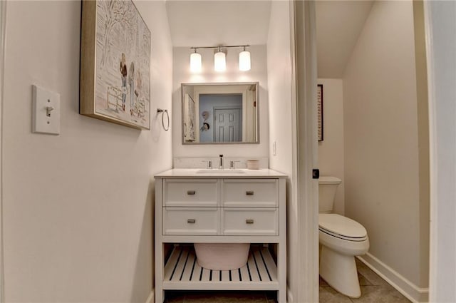 7920 Tintern Trce, Duluth, GA 30097 - bathroom with toilet, vanity, baseboards, and tile patterned flooring