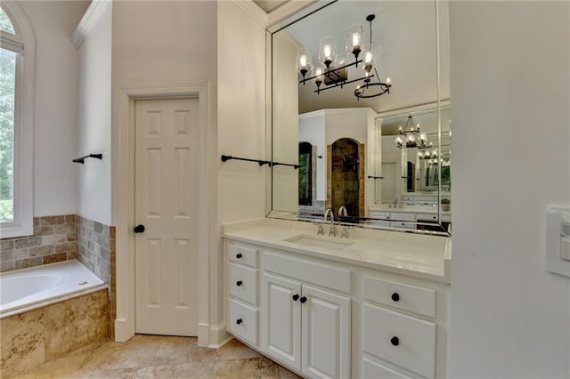 7920 Tintern Trce, Duluth, GA 30097 - bathroom featuring a chandelier, vanity, a bath, and ornamental molding