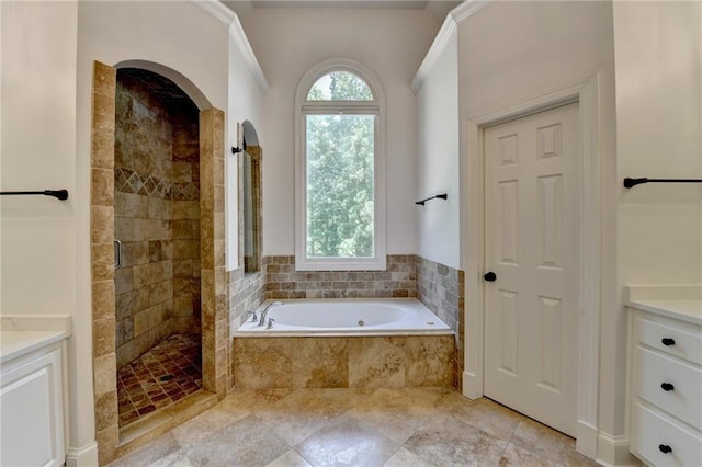 7920 Tintern Trce, Duluth, GA 30097 - full bathroom featuring vanity, a bath, and a stall shower