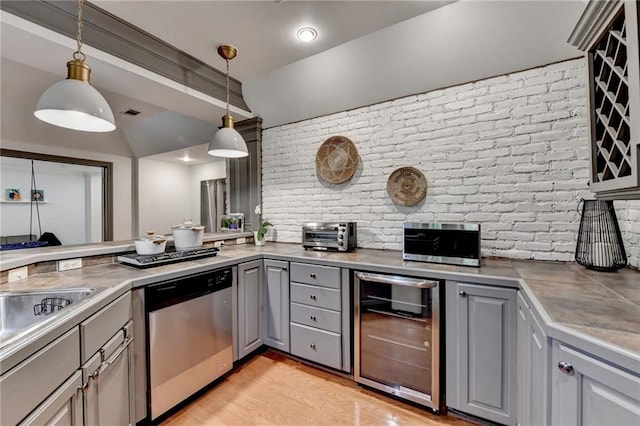 7920 Tintern Trce, Duluth, GA 30097 - kitchen with gray cabinets, wine cooler, stainless steel dishwasher, pendant lighting, and light wood-type flooring