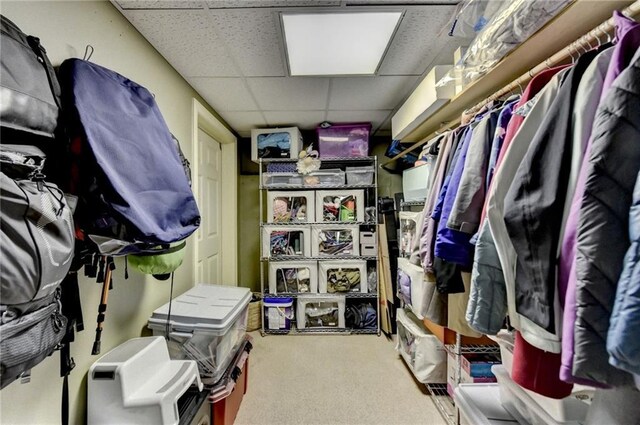 7920 Tintern Trce, Duluth, GA 30097 - spacious closet featuring a paneled ceiling and carpet