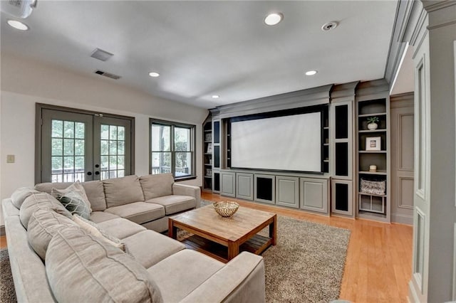 7920 Tintern Trce, Duluth, GA 30097 - home theater room with french doors, light wood-style flooring, and recessed lighting