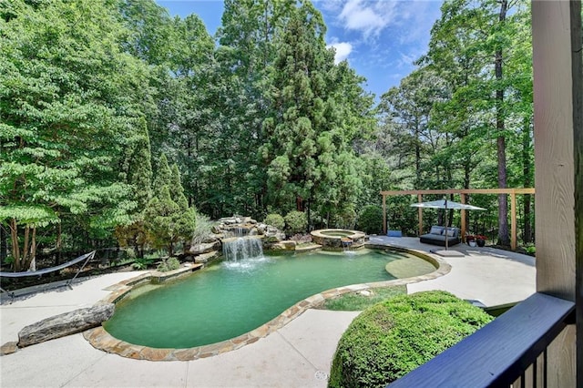 7920 Tintern Trce, Duluth, GA 30097 - view of swimming pool featuring a patio area and a pool with connected hot tub
