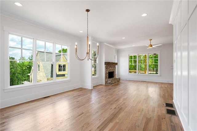 326 Reese Way, Ball Ground, GA 30107 - unfurnished living room featuring baseboards, light wood-type flooring, a fireplace, recessed lighting, and ceiling fan