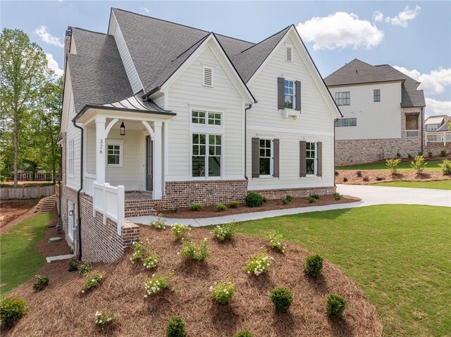 326 Reese Way, Ball Ground, GA 30107 - modern farmhouse with a front lawn, a standing seam roof, and a shingled roof