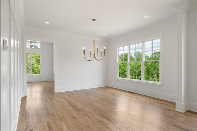 326 Reese Way, Ball Ground, GA 30107 - unfurnished dining area with plenty of natural light, a chandelier, baseboards, crown molding, and recessed lighting