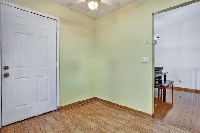 foyer entrance featuring ceiling fan and light hardwood / wood-style flooring