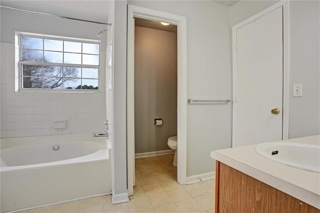 full bathroom featuring vanity, tile patterned floors, tub / shower combination, and toilet