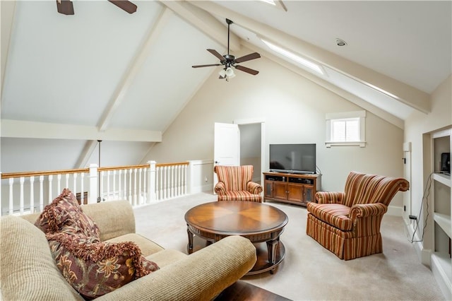 living room featuring lofted ceiling with beams, light carpet, and ceiling fan