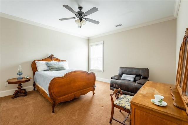 bedroom with ceiling fan, ornamental molding, and light colored carpet