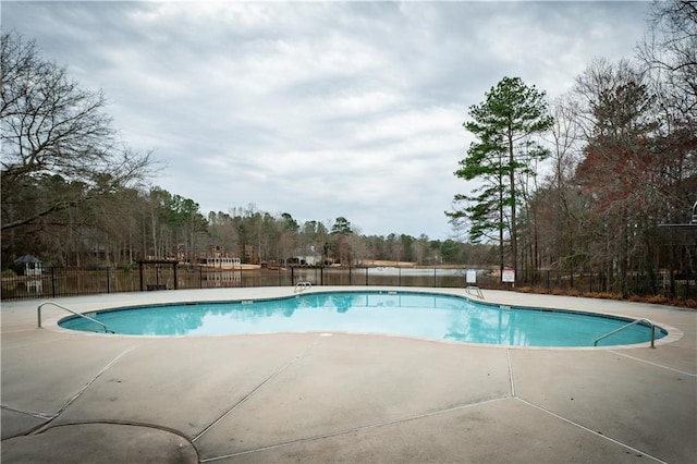 view of pool featuring a patio