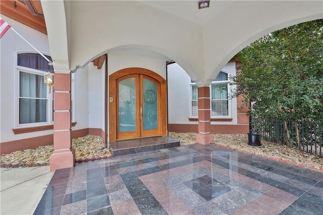 doorway to property featuring french doors