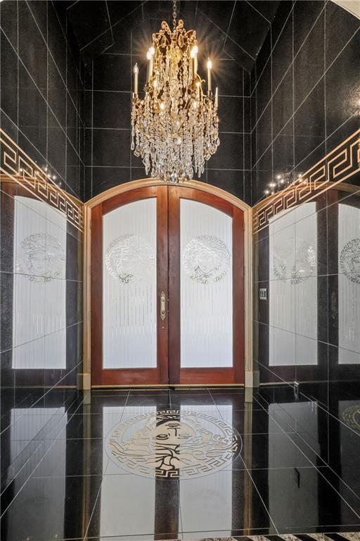 entrance foyer featuring french doors