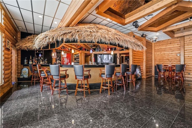 bar featuring log walls