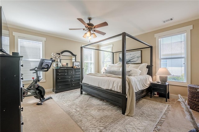 bedroom with light carpet and ornamental molding