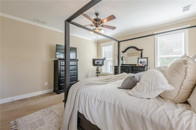 bedroom with crown molding, visible vents, and carpet flooring