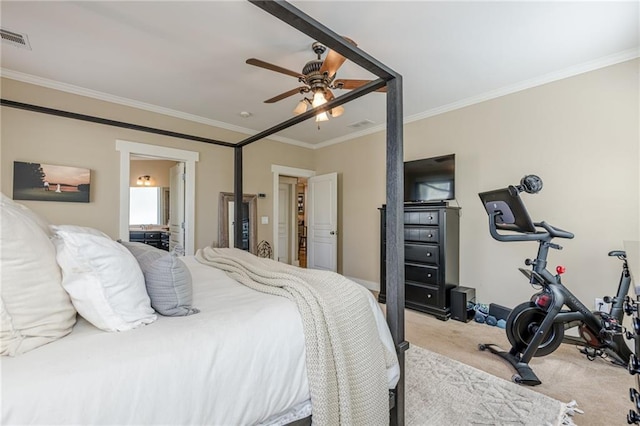 bedroom with ornamental molding, visible vents, ceiling fan, and light carpet