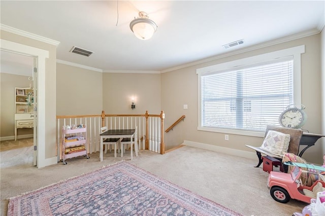 living area featuring an upstairs landing, ornamental molding, and visible vents
