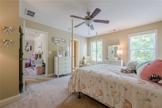 bedroom with attic access, baseboards, visible vents, and carpet floors