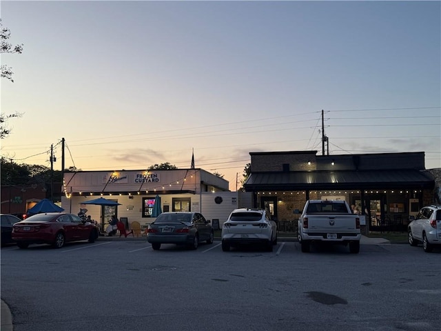 view of front of property featuring uncovered parking